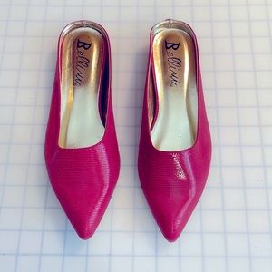 Bright pink faux snake skin mules